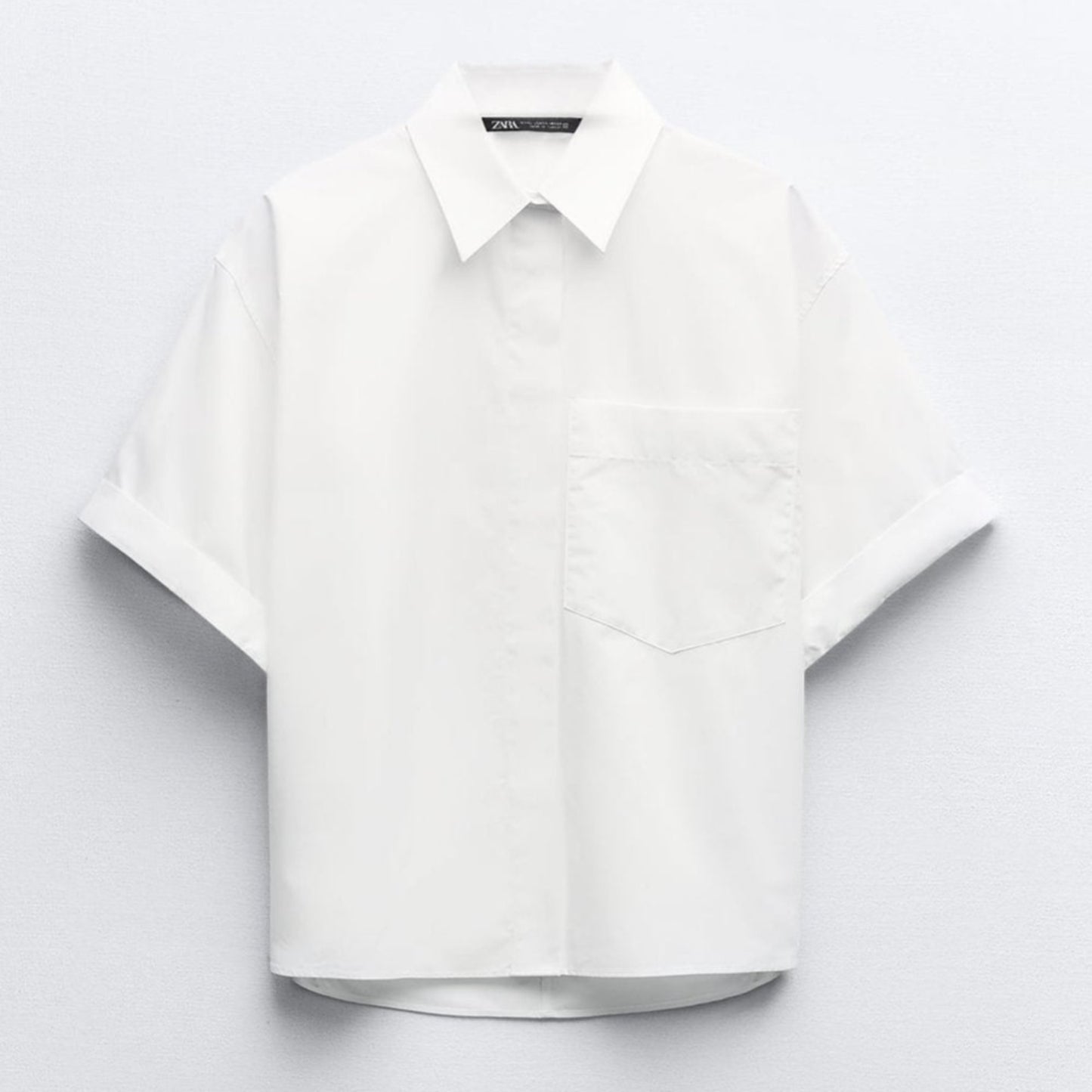White shirt on a light gray background