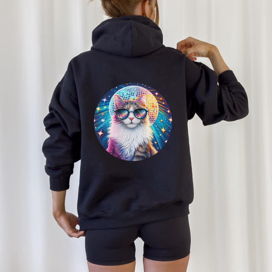Person wearing a black hoodie with a colorful cat graphic on the back against a white curtain background