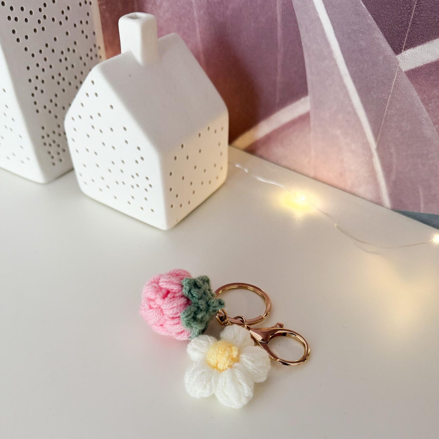 Keychain with floral design on a white surface