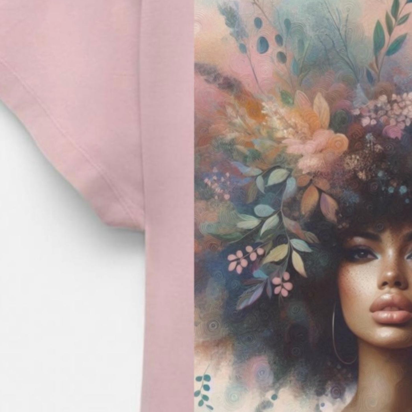 Pink t-shirt with a graphic of a woman with flowers in her hair on a white background