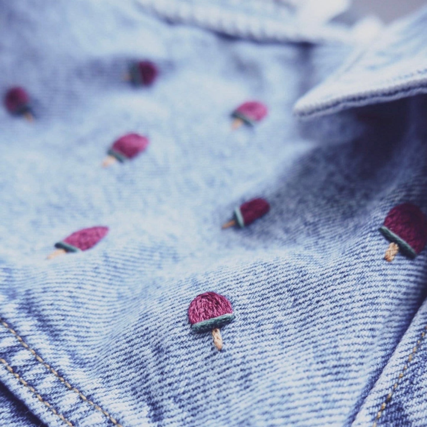 Embroidered ice cream popsicles on a denim jacket