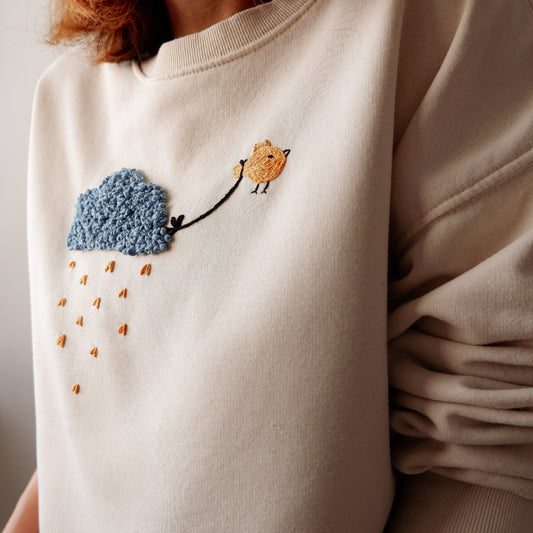 Hand Embroidered “April Showers” Sweatshirt – Organic Cotton Bird Embroidery Top, Cozy Year-Round Pullover, Customizable S–XL