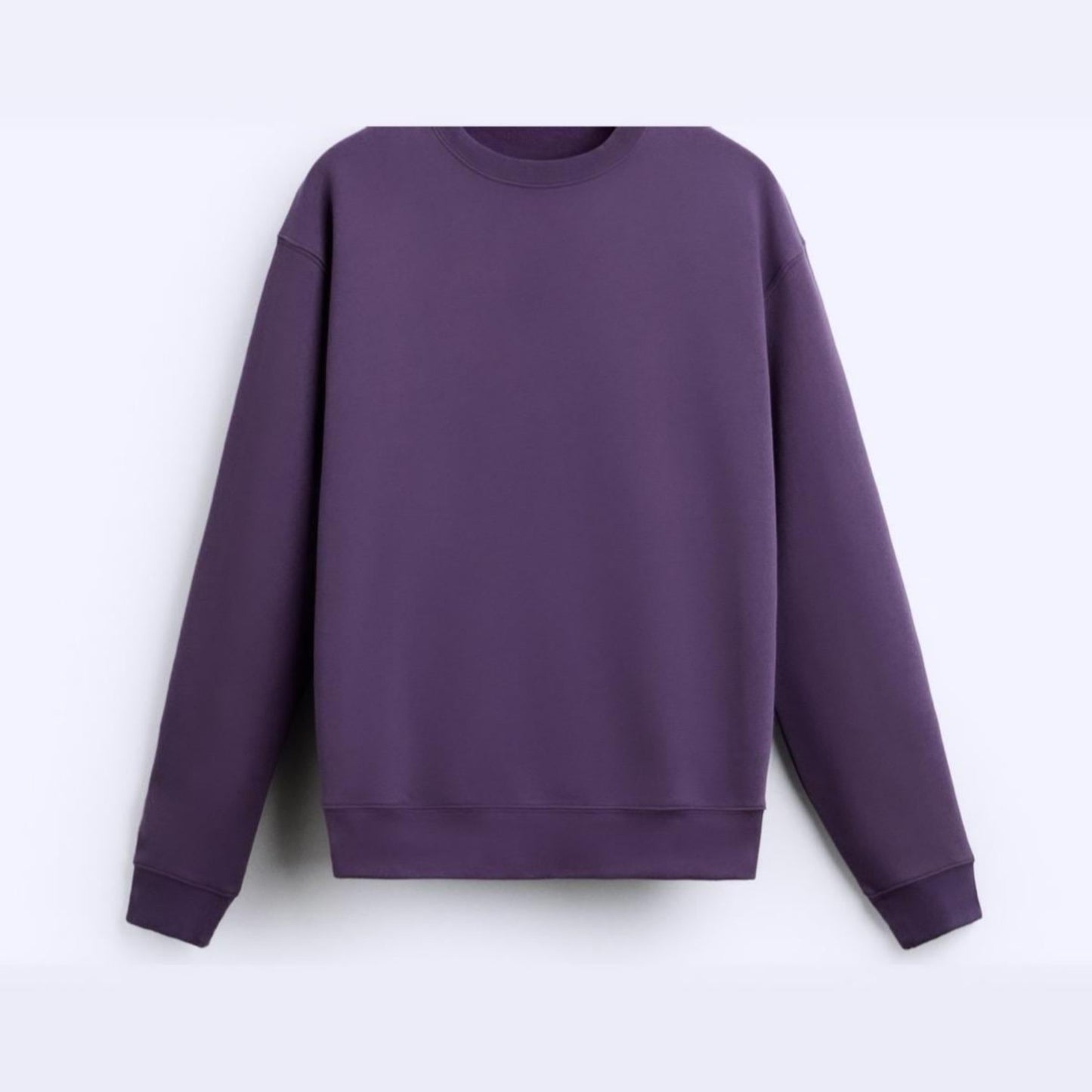 Purple sweatshirt on a light gray background