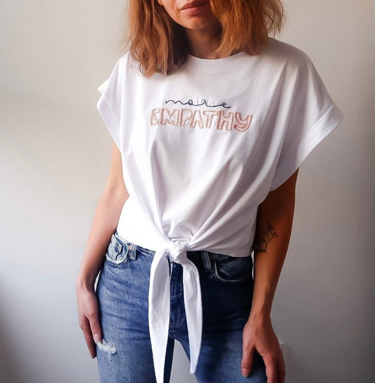 Hand Embroidered “More Empathy” T-Shirt – 100% Cotton White Knot Tee, Positive Slogan Top, Lightweight Summer Shirt