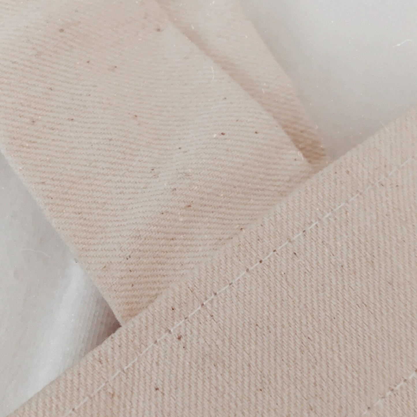 Close-up of beige fabric texture